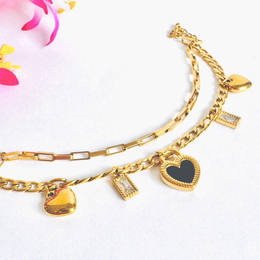 Pulsera doble de corazones